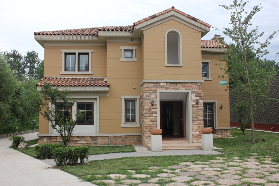 运用了卷材涂料技术彩石雕的仿石材建筑外立面